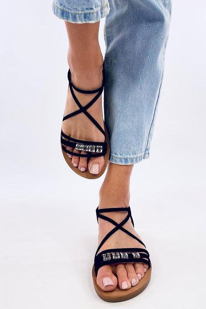 Stylish Inello women's sandals with artificial leather material, showcasing refined crisscross design and chic gold accents, perfect for summer elegance.