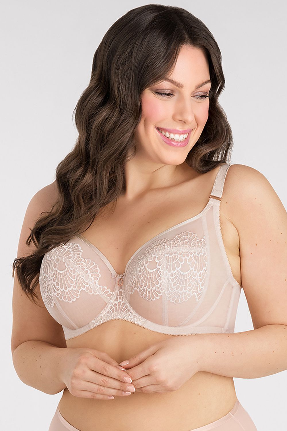 Elegant wire-free bra for larger breasts by Gorsenia, showcasing exquisite embroidery and a charming bow detail, designed for ultimate comfort and support.