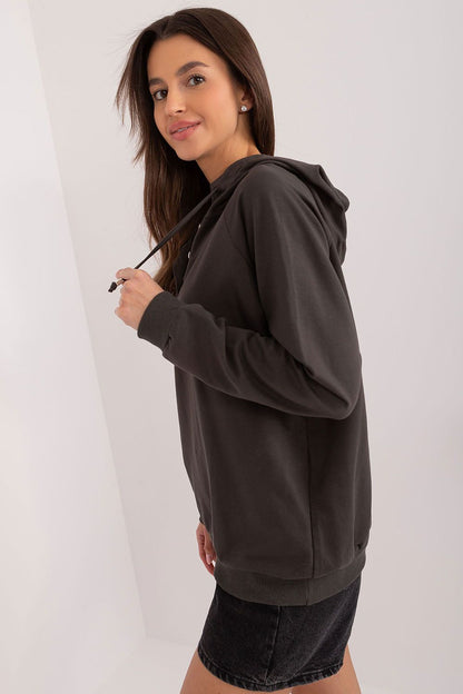 Close-up detail of the Relevance women's casual hoodie, featuring its high-quality cotton fabric and adjustable drawstrings for a luxurious and comfortable look.