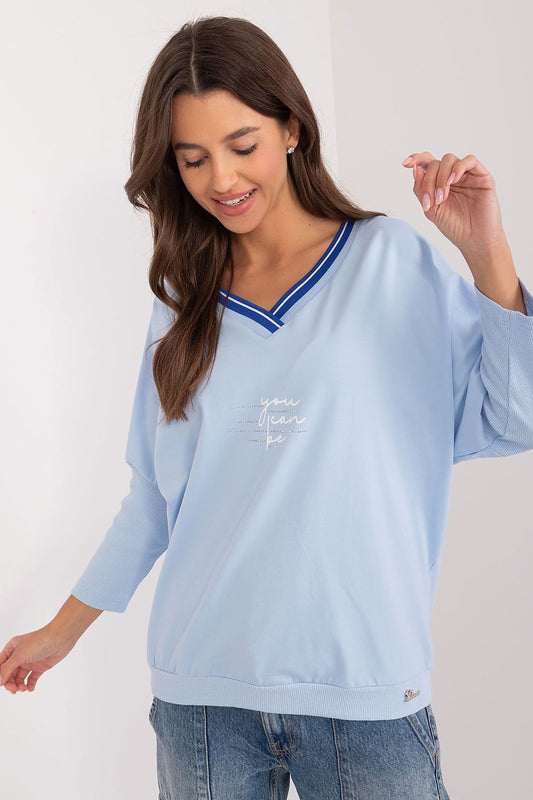 Elegant 3/4 sleeve cotton blouse from Relevance featuring a stylish v-neck design and unique original print, perfect for casual everyday wear.