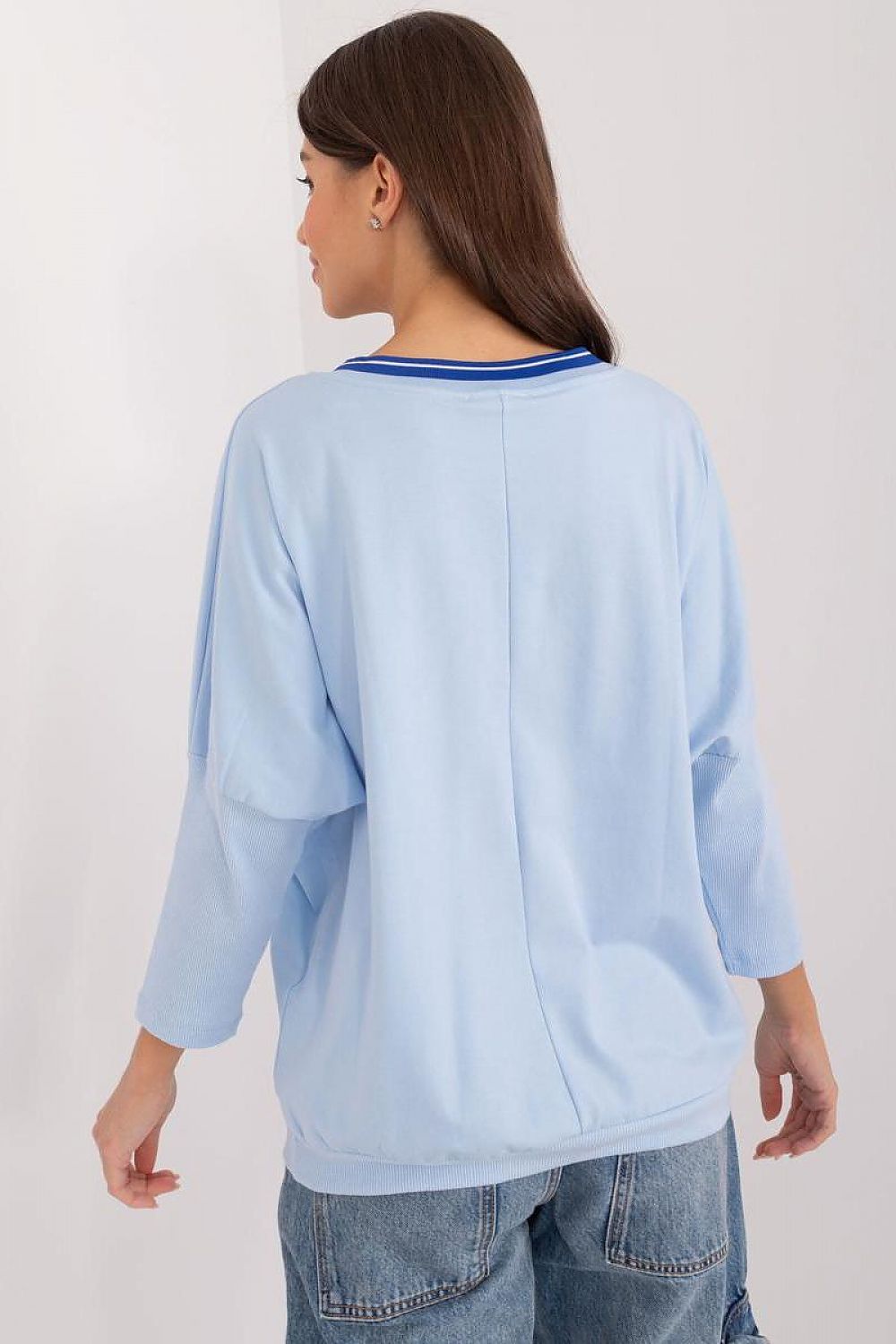 Chic and comfortable 3/4 sleeve blouse from Relevance made of breathable cotton, featuring original print and subtle embellishments for everyday elegance.