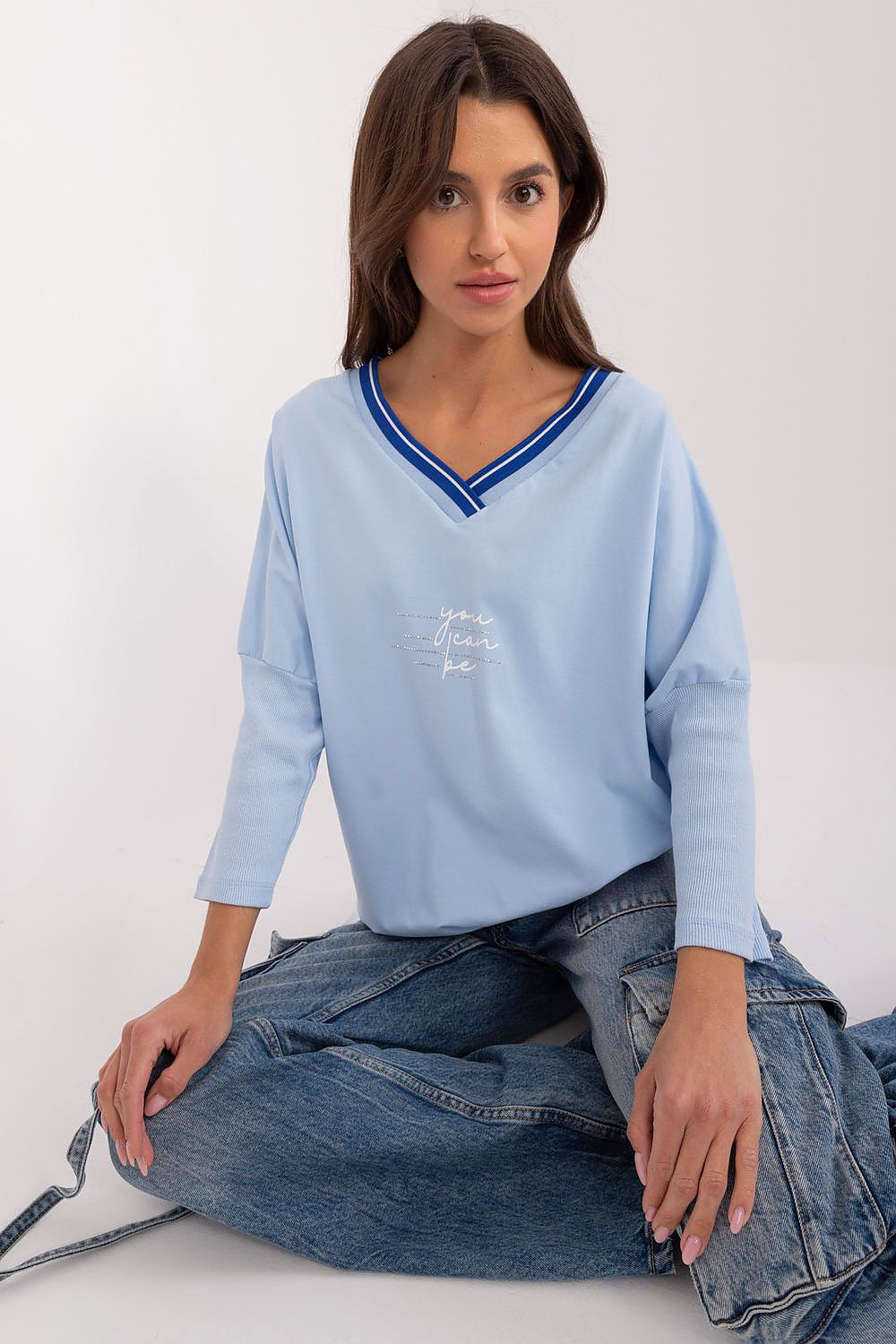 Elegant 3/4 sleeve cotton blouse with V-neck and original print from Relevance, perfect for casual everyday style.