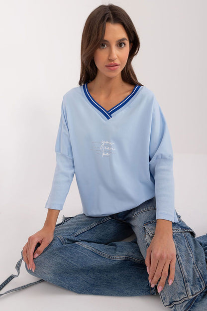 Elegant 3/4 sleeve cotton blouse with V-neck and original print from Relevance, perfect for casual everyday style.