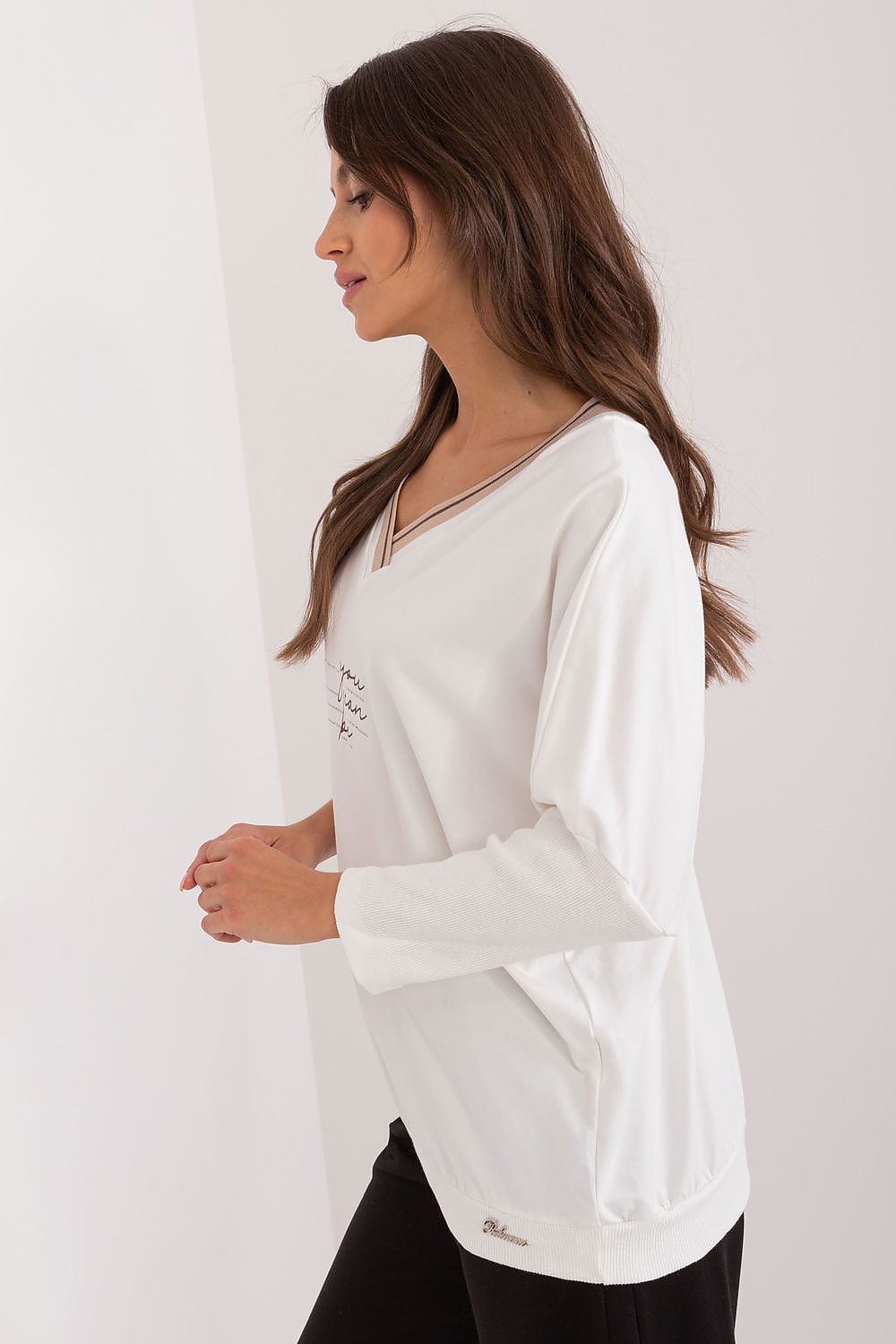 Chic 3/4 sleeve blouse crafted from high-quality cotton by Relevance, showcasing subtle embellishments for a distinctive touch.