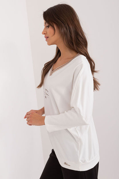 Chic 3/4 sleeve blouse crafted from high-quality cotton by Relevance, showcasing subtle embellishments for a distinctive touch.