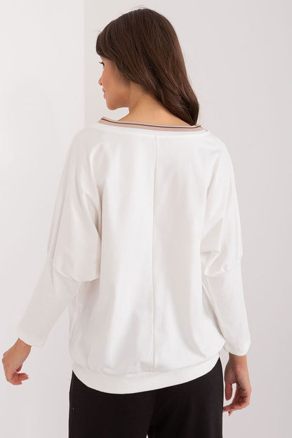 Elegant Relevance cotton blouse with original print and studs, tailored for effortless everyday elegance.