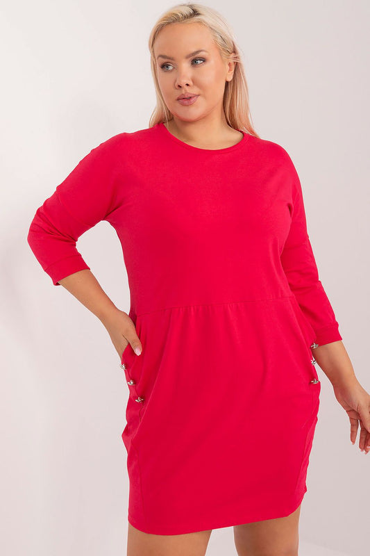 Elegant plus size cotton dress by Relevance featuring 3/4 sleeves and decorative pocket buttons, perfect for stylish everyday outings.