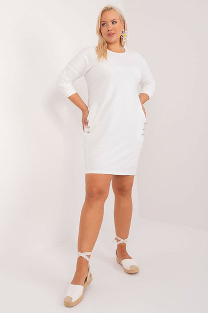 Elegant plus size cotton dress by Relevance with 3/4 sleeves and decorative pocket buttons, perfect for any occasion.