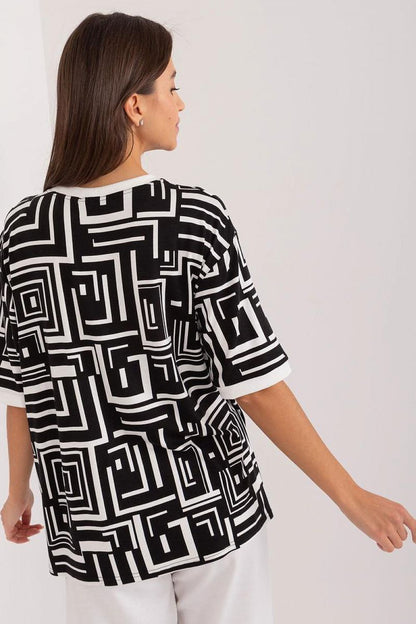 Versatile Lakerta blouse designed for modern women, featuring a standard length and a striking geometric pattern that enhances stylish outfits.