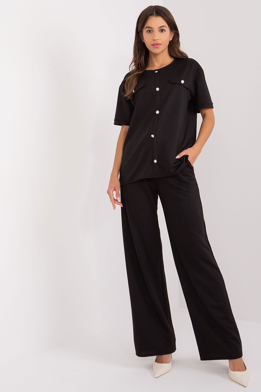 Elegant women's blouse and pants set by Lakerta, crafted from a luxurious cotton blend for stylish everyday wear.