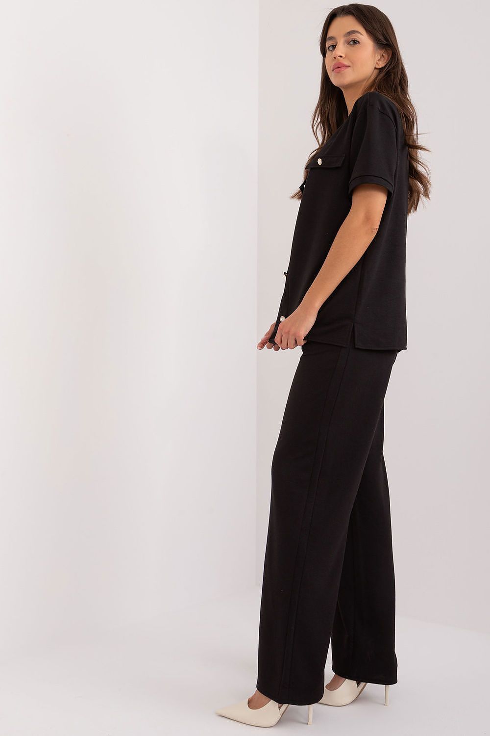 Women's high-rise trousers from Lakerta's Elegance Collection, featuring a practical waist tie and chic side pockets for a stylish silhouette.