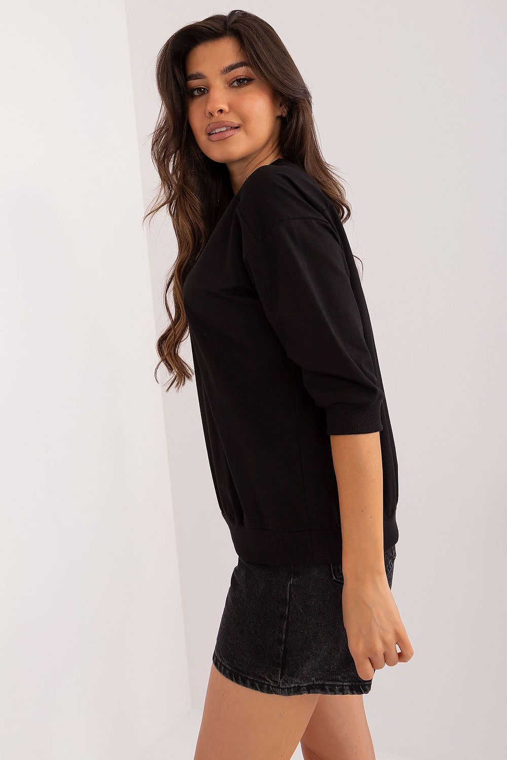 Close-up view of the luxurious fabric of Relevance's everyday blouse, showcasing the unique jet pattern and soft texture suitable for any occasion.