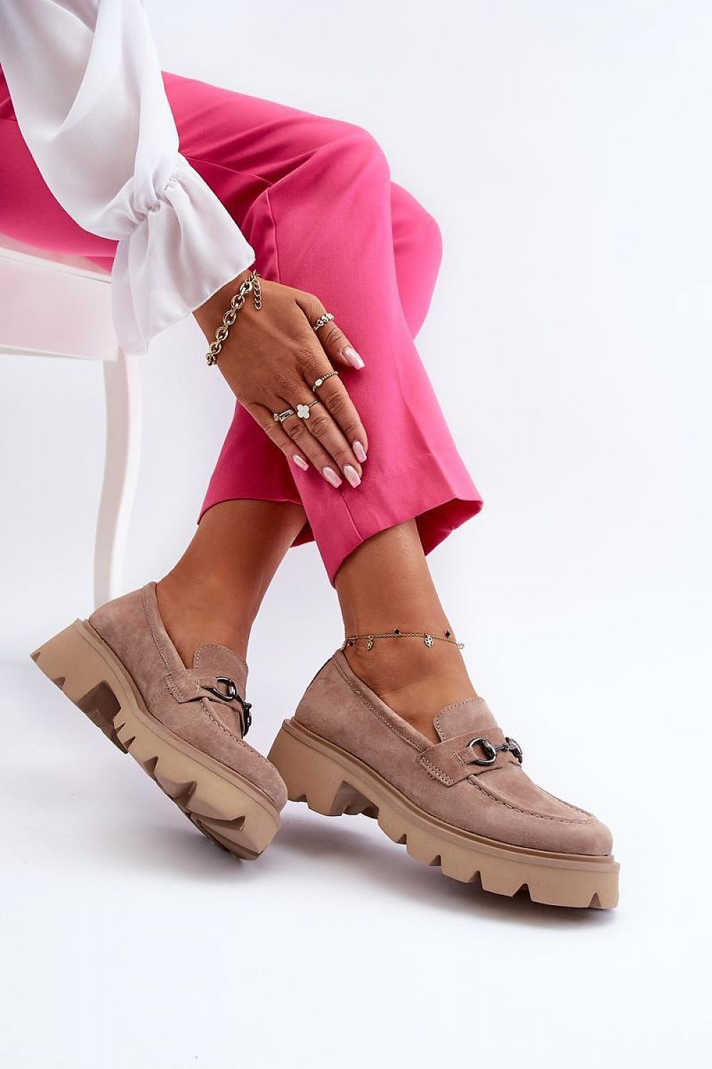 Side view of Vinceza's elegant suede moccasins, featuring a chic design perfect for fashionable women seeking comfort and style.