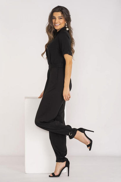 Sophisticated Awama jumpsuit with adjustable leg straps, enhancing personal style and comfort.
