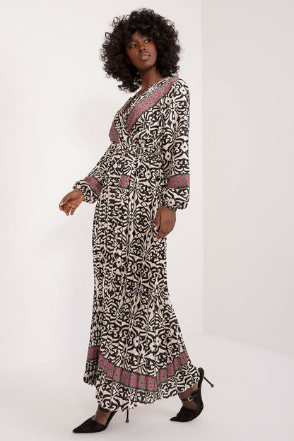 Elegant maxi dress with colorful print and tie belt from Italy Moda, showcasing a sophisticated envelope neckline and flared cut.