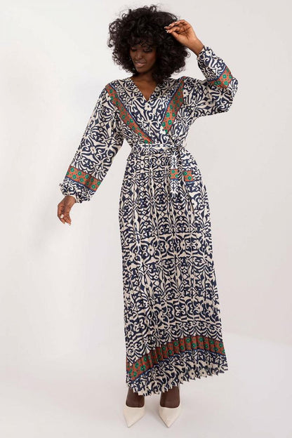 Elegant maxi dress by Italy Moda featuring a vibrant colorful print, designed for luxurious comfort and style.