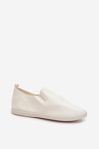 Sophisticated profile view of Step in Style women's slip-on sneakers, ideal for casual and school wear.