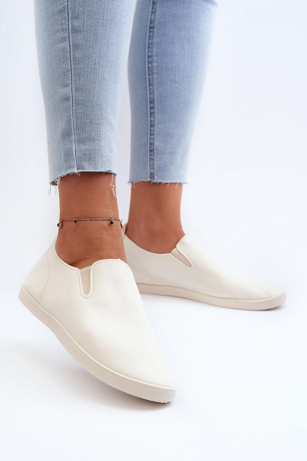 Beautifully crafted Step in Style women's sneakers highlighting the slip-on design for effortless wear and chic style.
