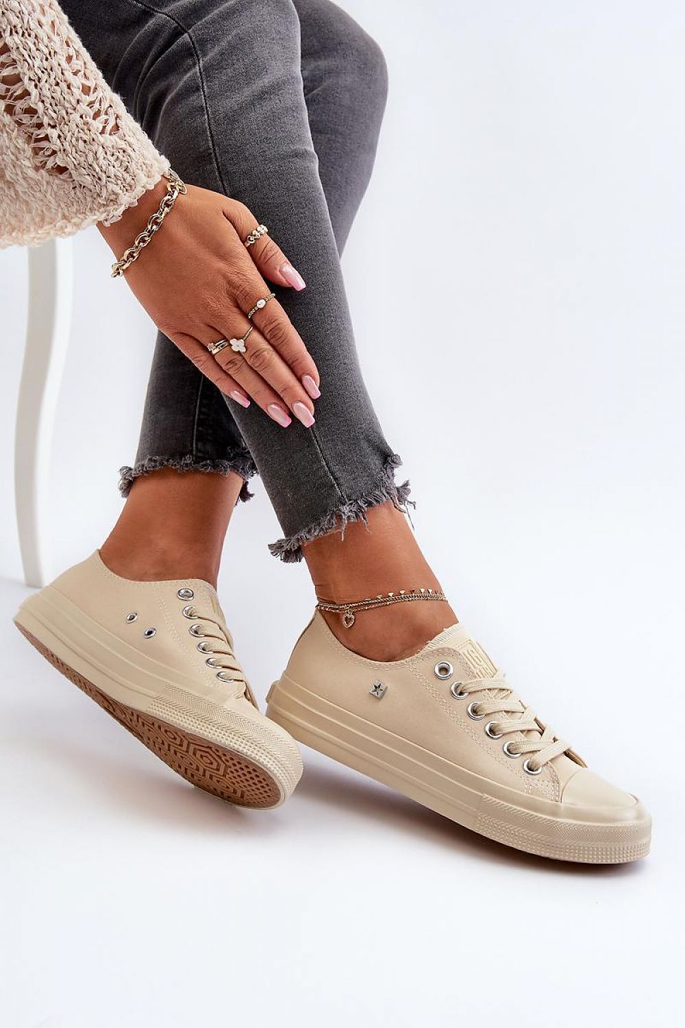 Sophisticated Step In Style sneakers designed for women, featuring a sleek silhouette and crafted from premium textile materials for all-day wear.
