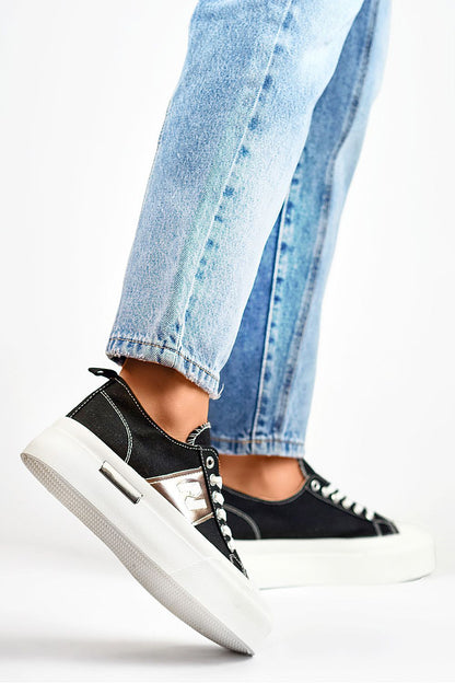 Chic PRIMO women's stylish sneakers featuring comfortable lacing and a light textile design, ideal for every occasion.