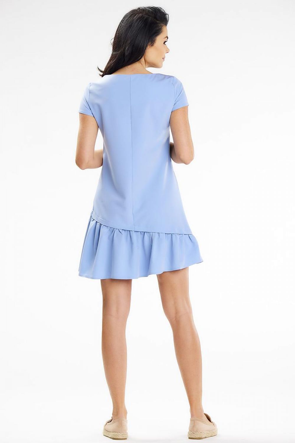 Awama mini trapeze dress styled elegantly for a summer event, showcasing a chic silhouette with a side zip closure.