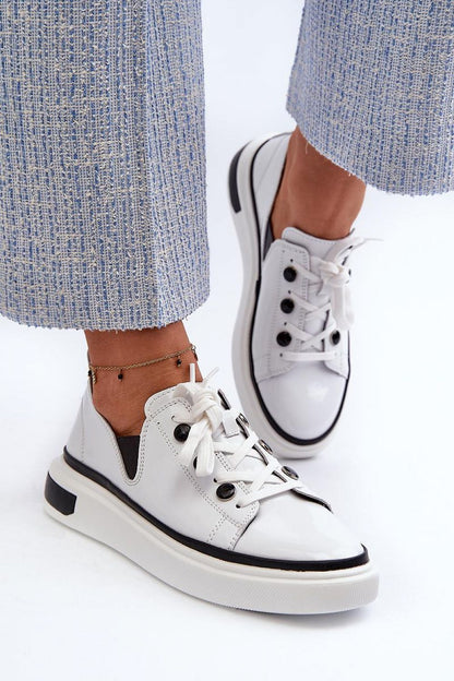 Stylish patent leather platform sneakers for women from Step in Style, showcasing a modern aesthetic with a comfortable fit and superior quality.