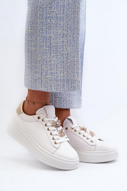 Luxury leather sneakers with unique studs and platform style, designed for women's comfort by Step in Style.