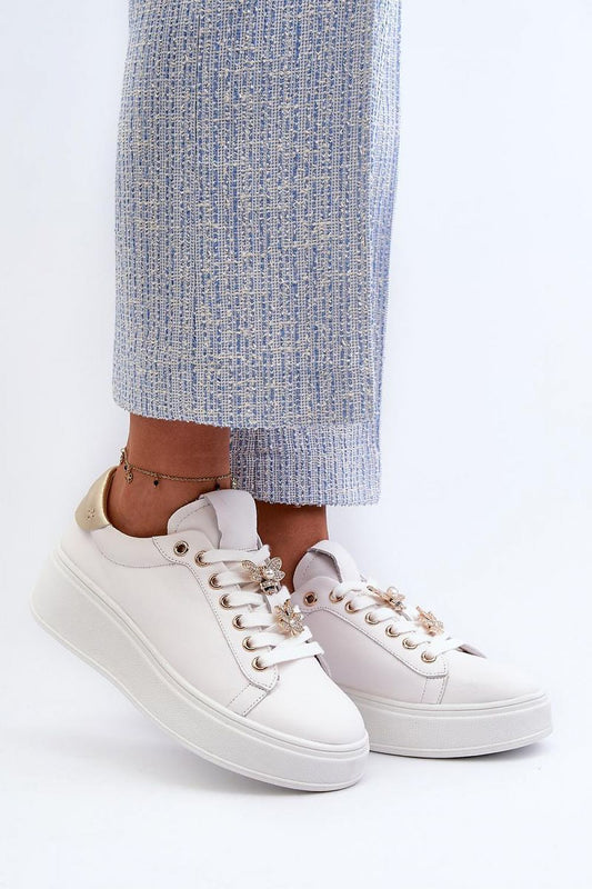 Luxury leather sneakers with unique studs and platform style, designed for women's comfort by Step in Style.