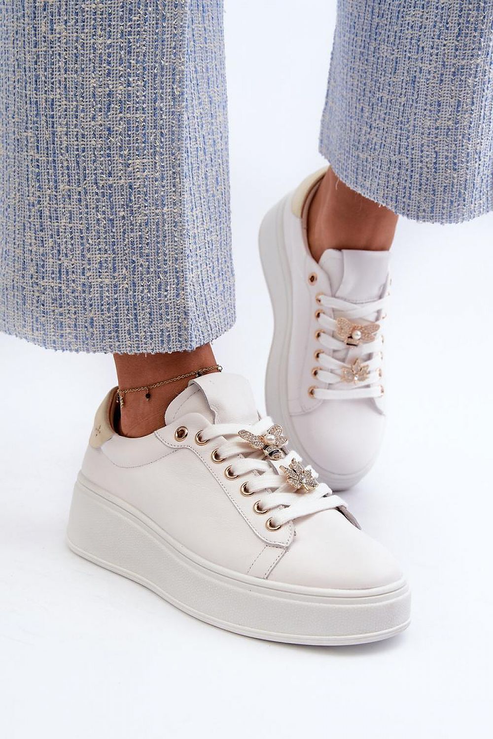 Elegant platform leather sneakers for women, combining chic studs with superior comfort, from Step in Style.