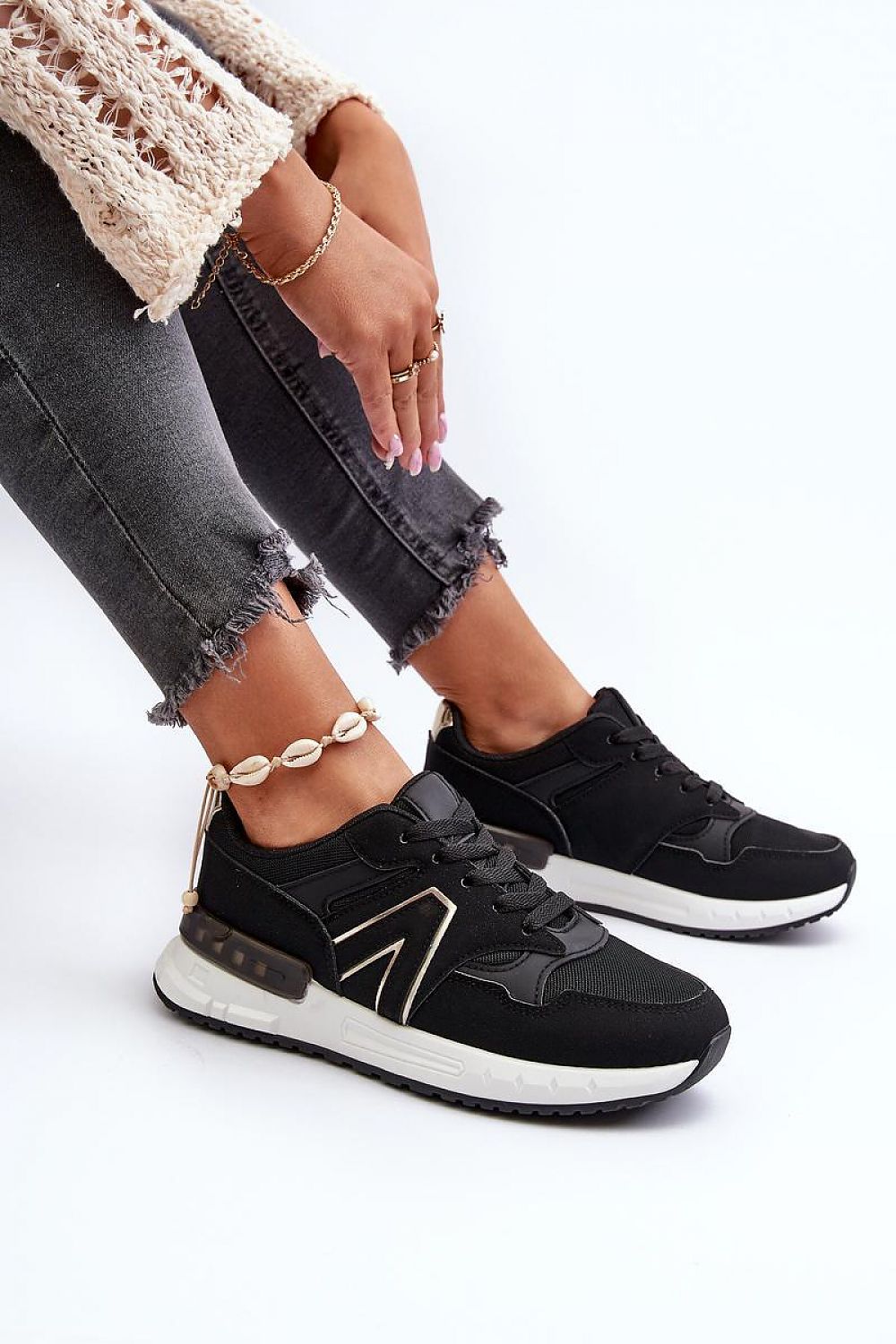 Elegant women's sneakers by Step in Style, highlighting a removable foam footbed and stylish 2.5cm platform for a modern, luxurious appearance.