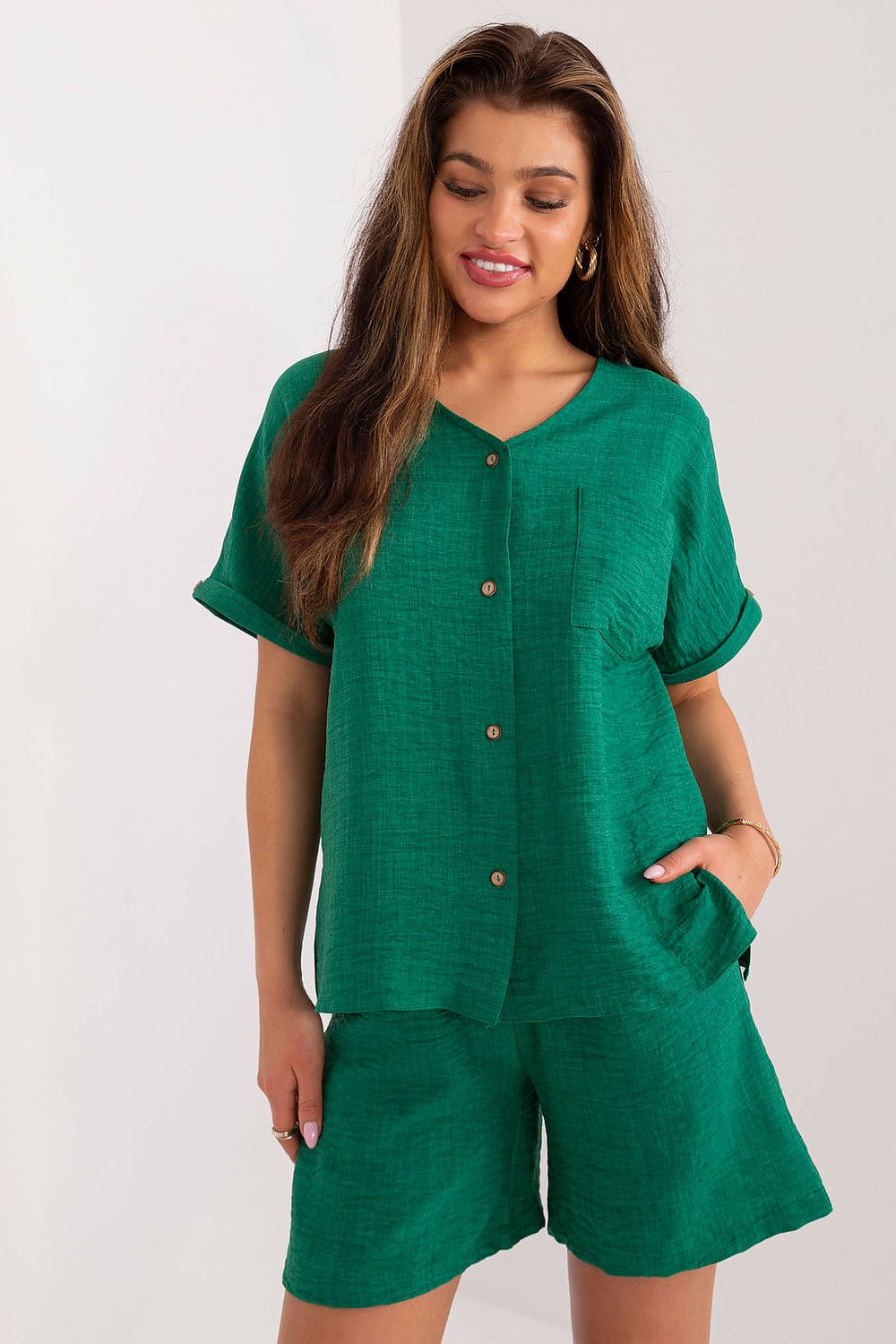 Elegant women's cotton-polyester casual set by Lakerta featuring a stylish v-neck shirt and high-waisted shorts, ideal for sophisticated summer outings.
