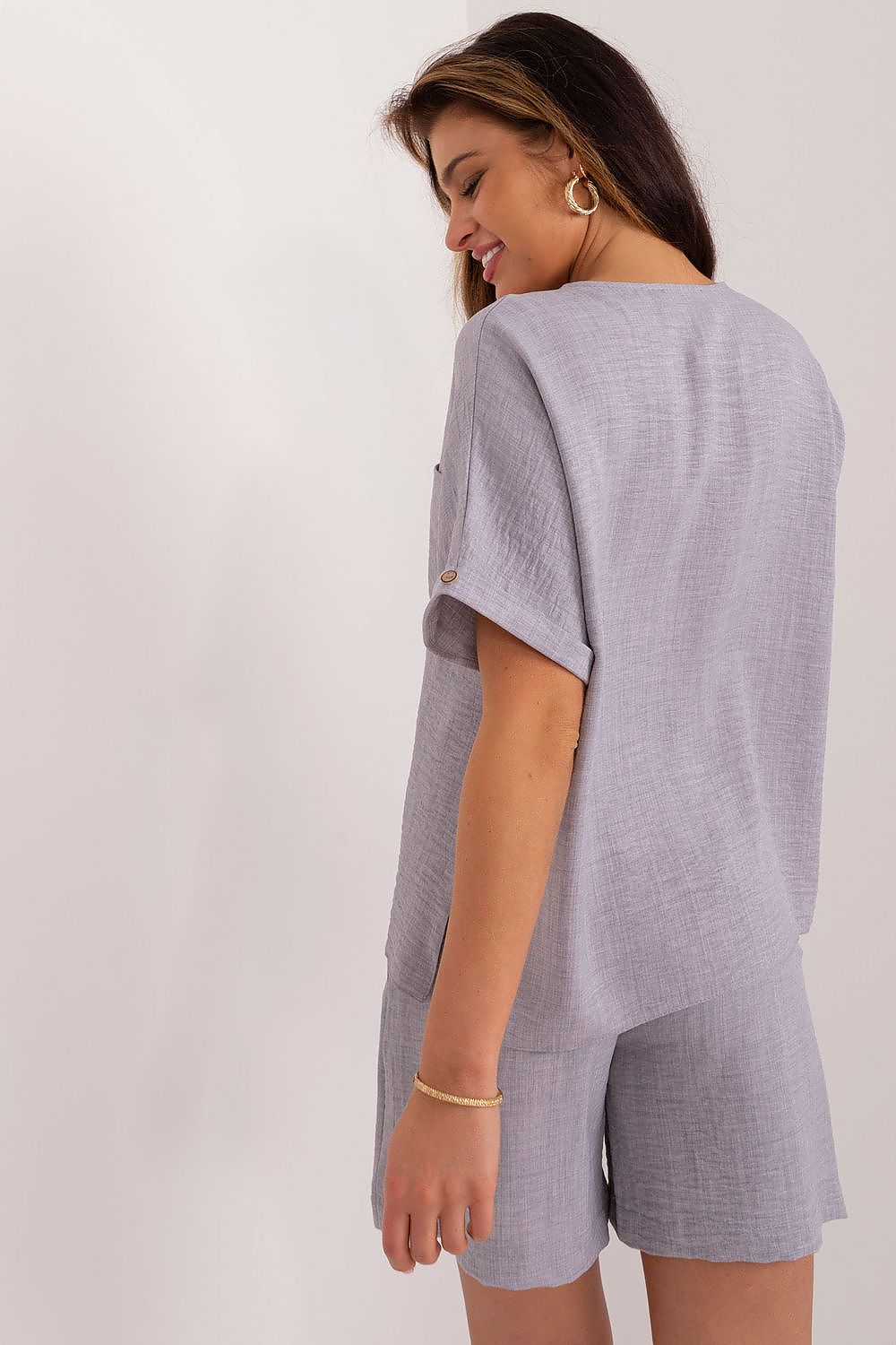 High-waisted shorts from Lakerta's elegant casual set, showcasing practical side pockets and a flattering fit.