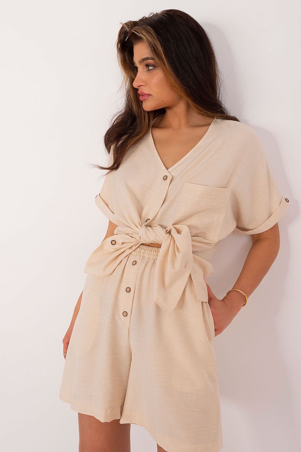 Elegant women's cotton-polyester casual set by Lakerta featuring a stylish v-neck shirt and high-waisted shorts, perfect for summer outings.