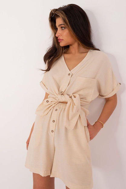 Elegant women's cotton-polyester casual set by Lakerta featuring a stylish v-neck shirt and high-waisted shorts, perfect for summer outings.