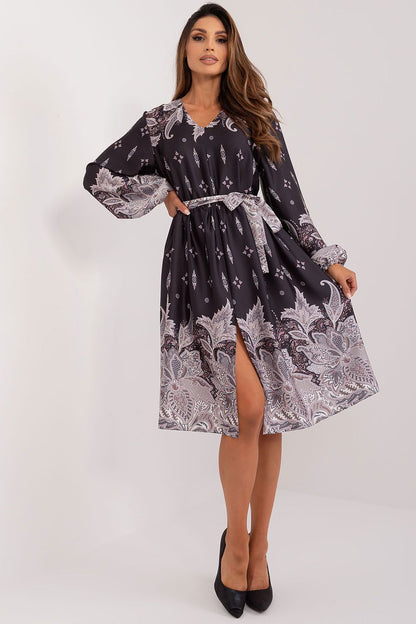 Elegant midi cocktail dress by Lakerta featuring a heart neckline, long sleeves and a unique print, perfect for sophisticated occasions.
