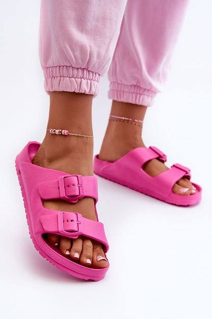 Chic adjustable strap women's flip-flops from Step in Style, designed for a comfortable fit and elegance by the water.