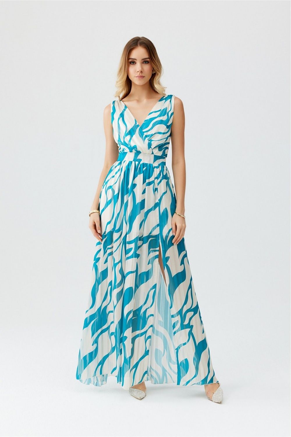 Close-up of the airy chiffon fabric on an elegant maxi dress by Roco Fashion, highlighting the exquisite texture and luxurious feel.