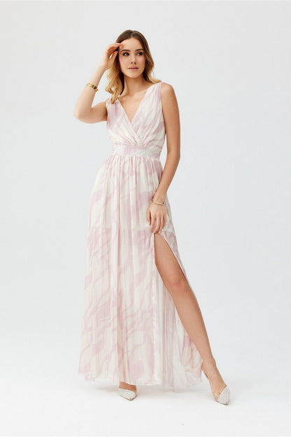 Elegant maxi chiffon dress by Roco Fashion featuring a cutout back and sophisticated leg slit, perfect for weddings and summer events.
