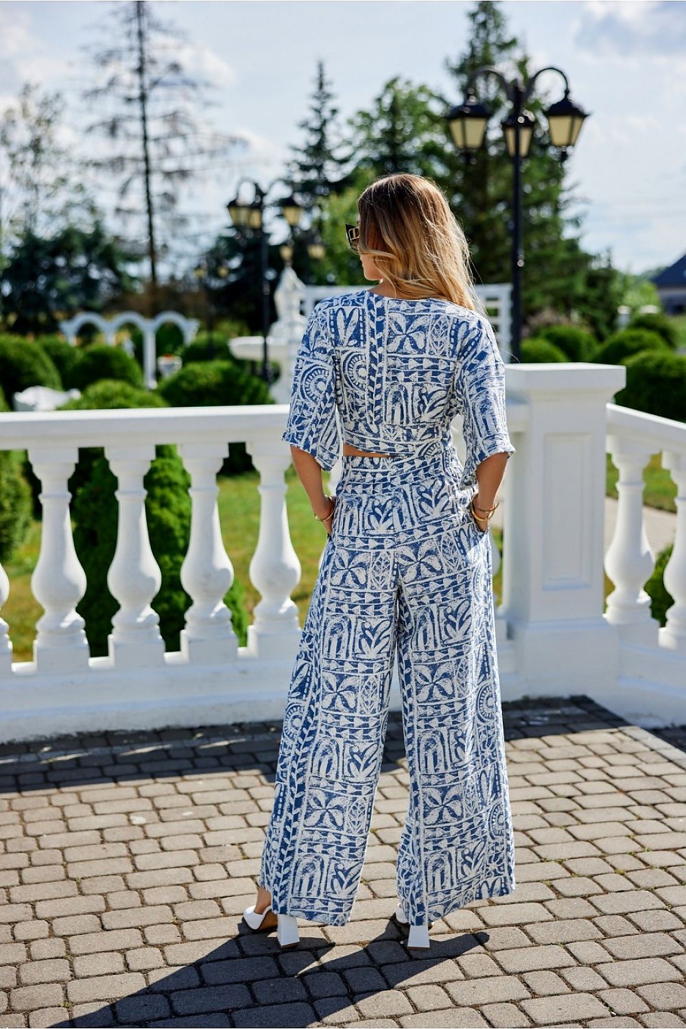 Stylish Ester Wide-Leg Pants by Roco Fashion, designed to accentuate the waist, ideal for creating a polished and refined look.