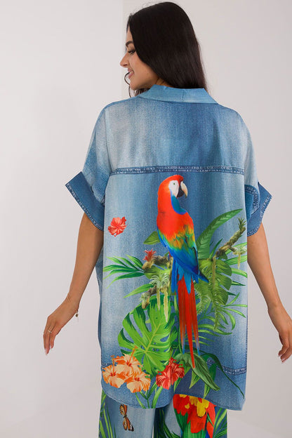 Model wearing Italy Moda's colourful printed viscose blouse, perfect for warm day casual elegance.