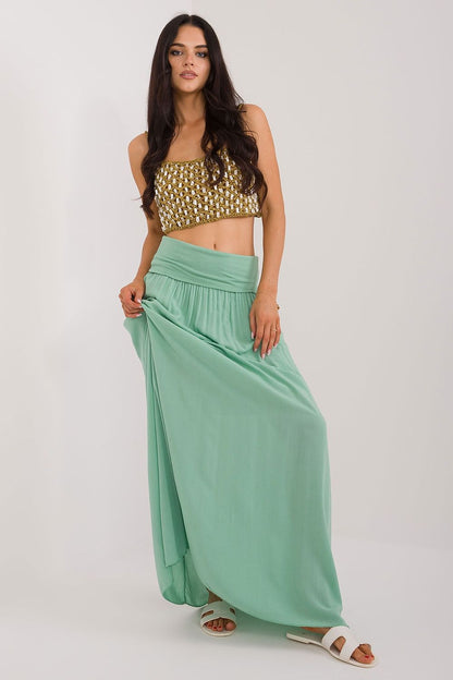 Elegant Och Bella Casual Maxi Skirt in smooth viscose material, showcasing unique creases for a stylish look, perfect for versatile dressing.