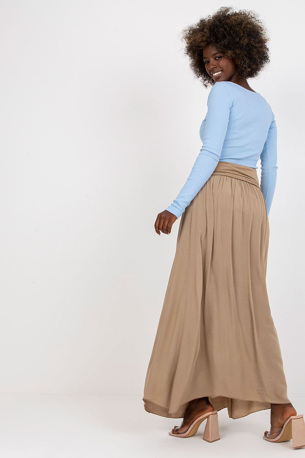 Versatile Och Bella Maxi Skirt worn as a dress, demonstrating its stylish adaptability and comfort, made from 100% viscose fabric for a breathable, high-quality feel.