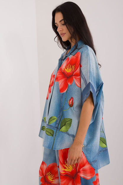 Flat lay of Italy Moda's colourful short sleeve women's shirt, displaying its vibrant pattern and sophisticated style.