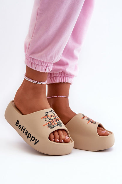 Elegant women's flip-flops decorated with a teddy bear design, offering comfort and style by Step in Style.