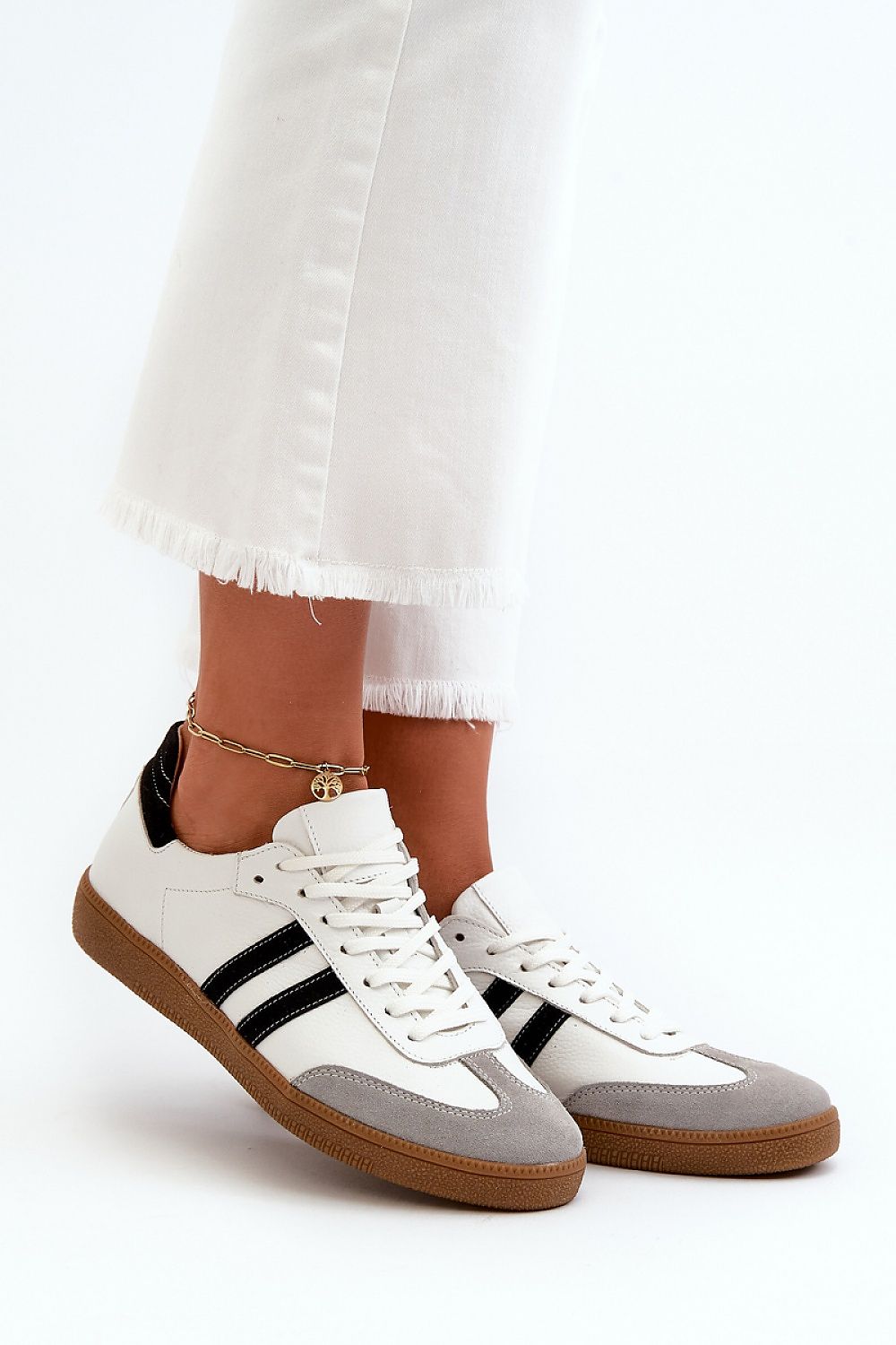Luxury women's natural leather sneakers by Step in style, featuring a stylish low lace-up design and soft insole for optimal comfort, ideal for any elegant or casual outfit.