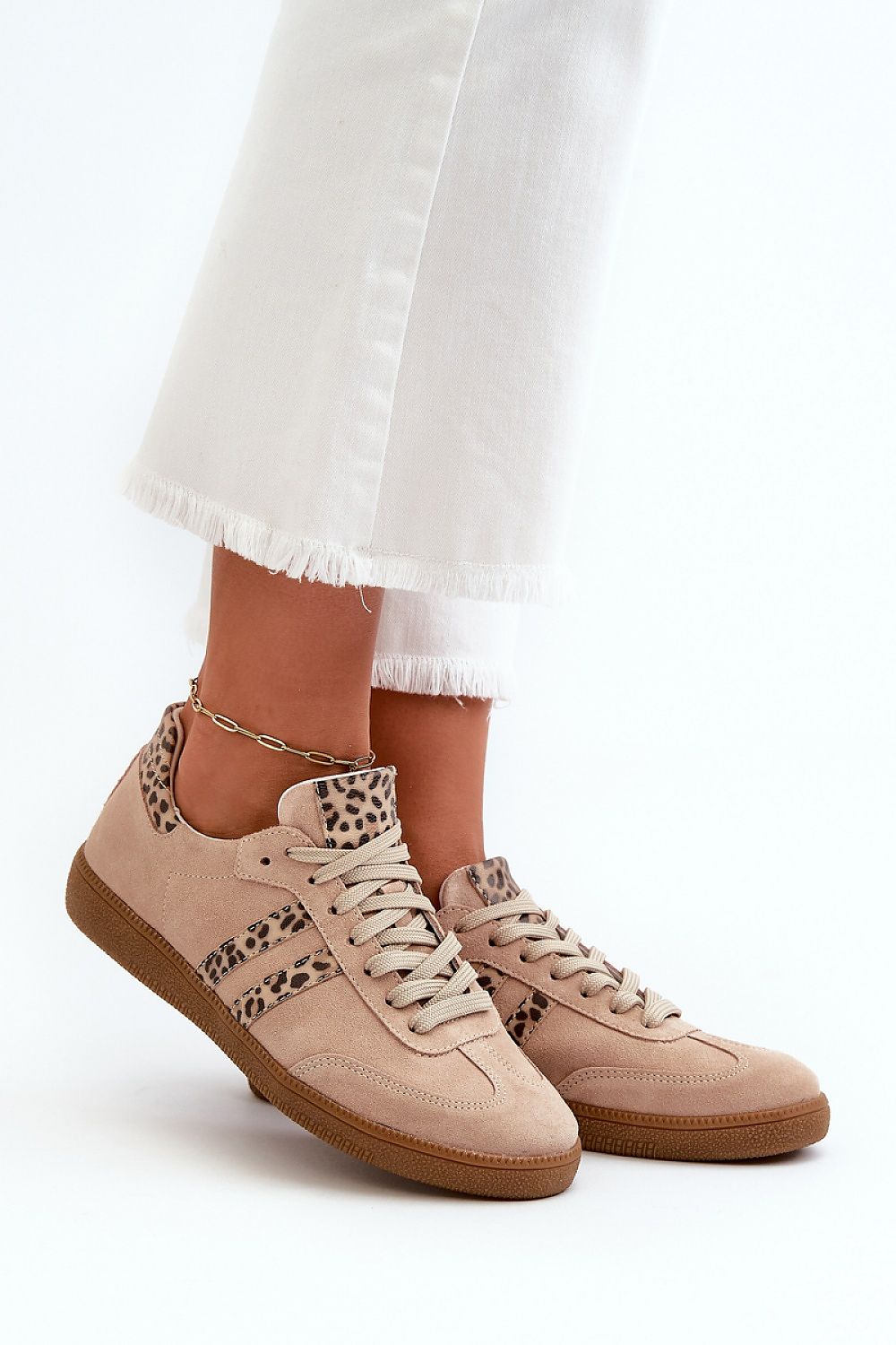 Stylish women's sneakers in luxurious natural leather, showcasing versatility for both casual and elegant looks, from Step in style.