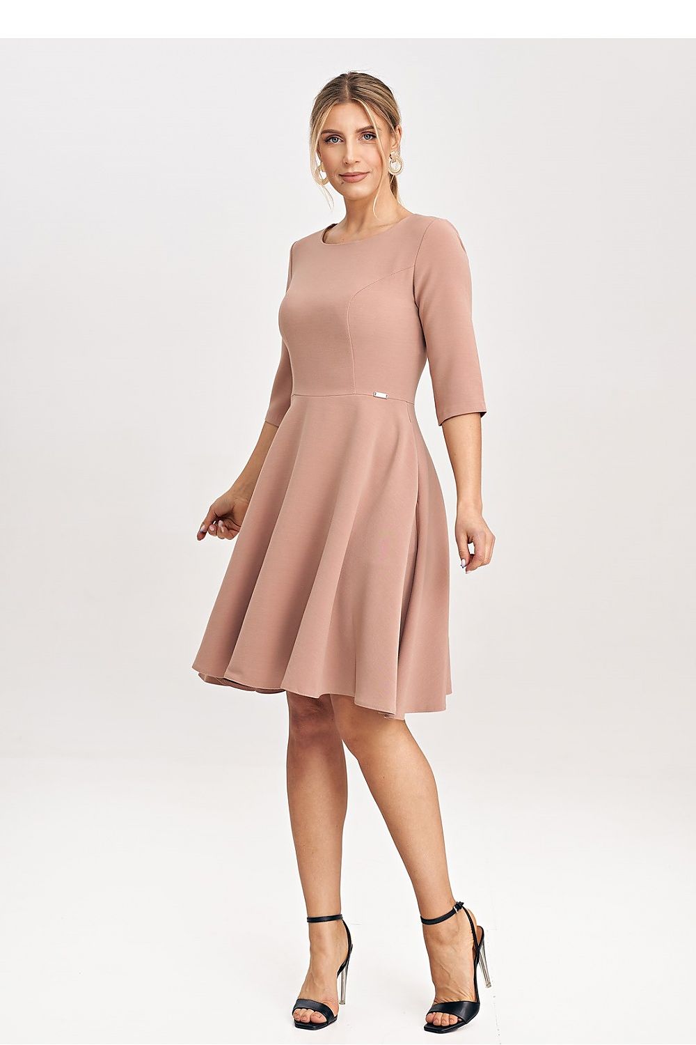 Close-up of the luxurious fabric of Figl's Elegant Flared Daydress, showcasing its delicate design and structured waist for a perfect silhouette.