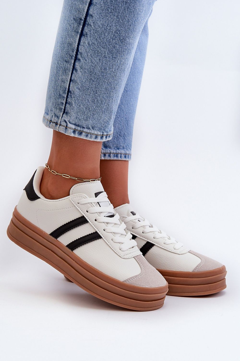 Elegant women's platform sneakers by Step in Style, featuring a sleek design with a removable foam insole for ultimate comfort.