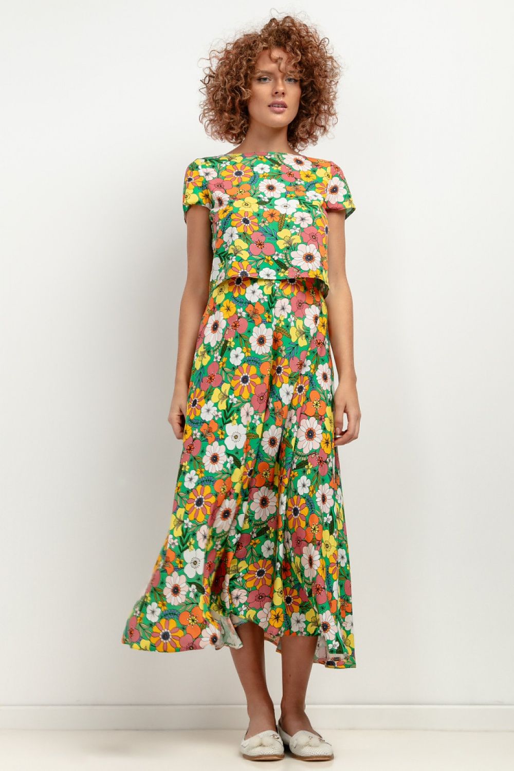 Elegant maxi viscose skirt by Tessita, showcasing its lightweight fabric and stunning original pattern, perfect for summer outings.