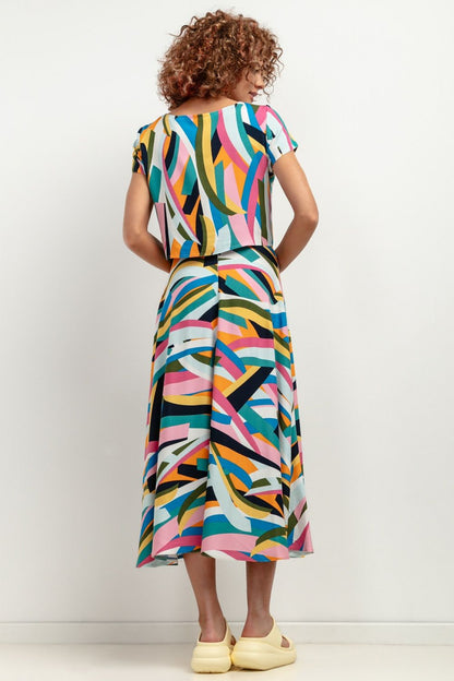Elegant maxi viscose skirt by Tessita, showcasing a stunning patterned design, perfect for summer wear.
